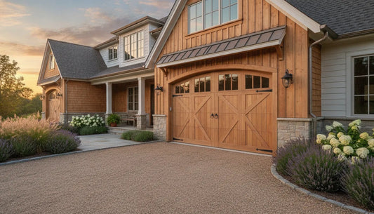 Custom wood barn style garage door on a refined farmhouse home
