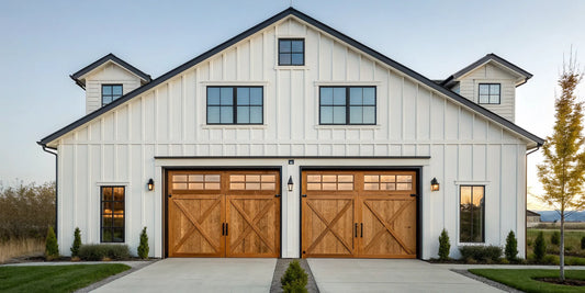 Double barn style garage doors with a natural wood finish on a modern home.